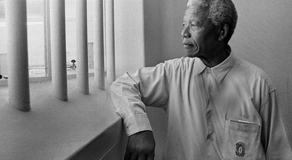 N.Mandela in his cell on Robben Island (revisit} 1994